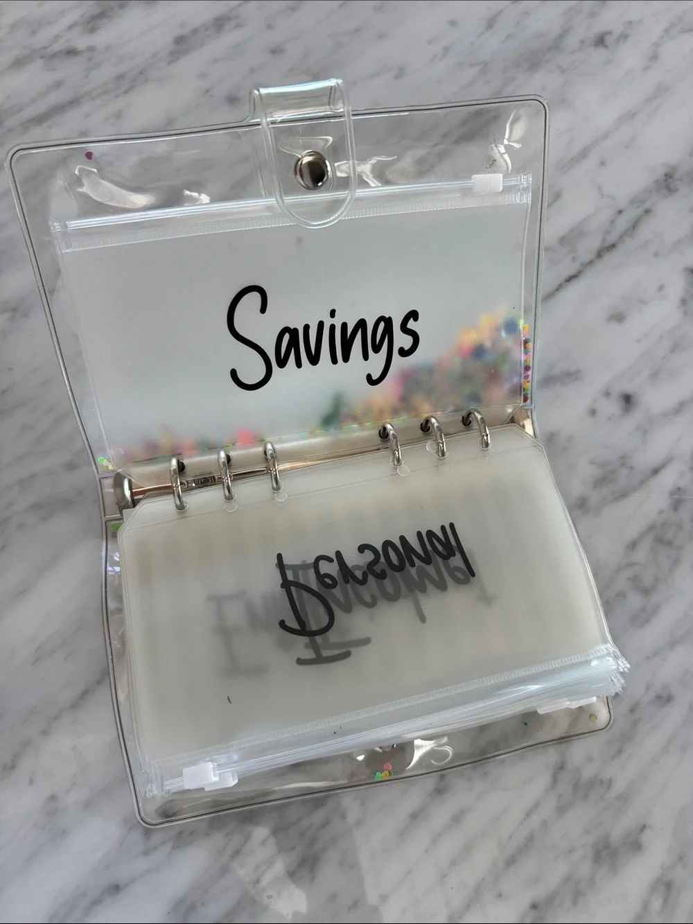 Savings Binder with Zipper Pouches. Clear pvc.